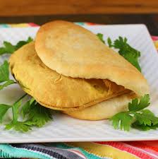 Patty in Coco Bread - Traditional Jamaican beef patty served in soft, sweet coco bread